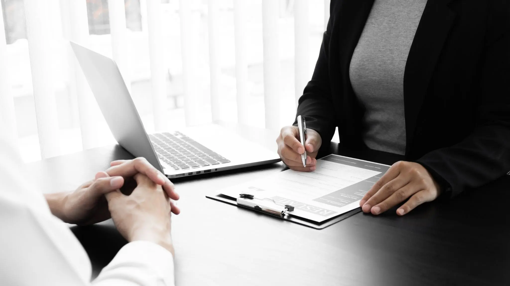 Foreign entrepreneur preparing documents to start a business in Thailand.